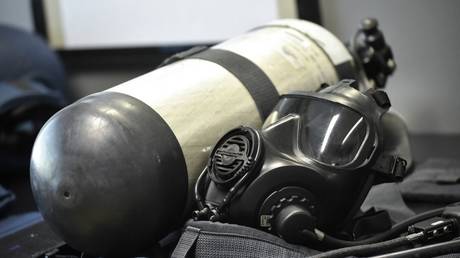 An oxygen bottle and a mask are displayed at the OPCW (The Organisation for the Prohibition of Chemical Weapons) headquarters in The Hague, The Netherlands, April 20, 2017