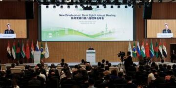 Argentina drops dollar in debt payments