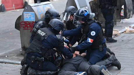 Police arrest a man during a protest in Nantes, France, June 30, 2023