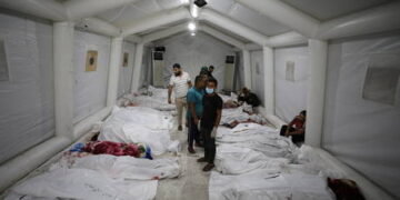 Israel and Palestinians trade blame for deadly hospital strike