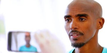 Runner banned for using car during race