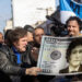 Argentina’s new president begins ‘shock therapy’ by devaluing peso