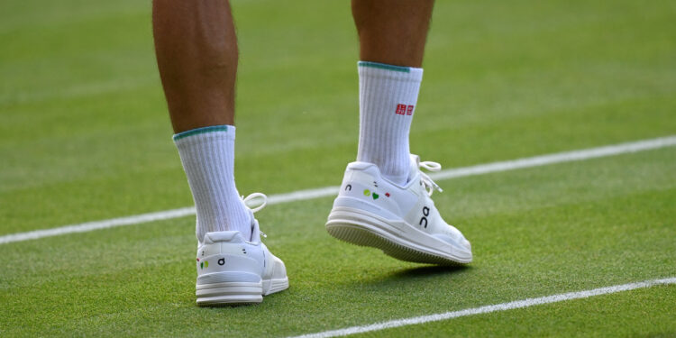 Shoemaker endorsed by Roger Federer under fire over markups and labor practices