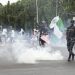 Nigerian leader demands end to violent protests