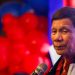 Former Philippines president charged with ‘crimes against humanity’
