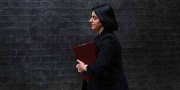 Thousands protest new migrant camp in UK