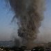 Smoke rising over Manama Bahrain near U.S. Fifth Fleet headquarters following Iranian missile strike February 2026