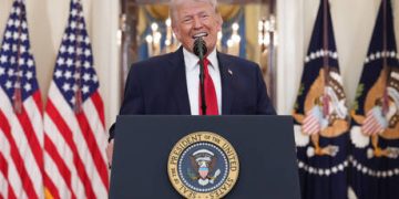 Democrats take Trump to court over voting curbs