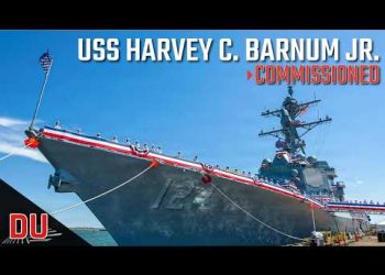 What makes USS Harvey C. Barnum Jr. a mighty surface combatant ?