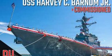 What makes USS Harvey C. Barnum Jr. a mighty surface combatant ?