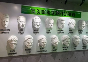 Candace Owens poses with Macron sculpture at SPIEF (PHOTOS)