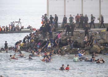 Why did nearly 60,000 migrants suddenly storm the border into Spain?