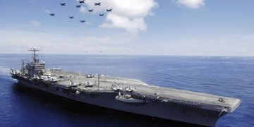 Troubled US aircraft carrier heads home after protracted deployment – media